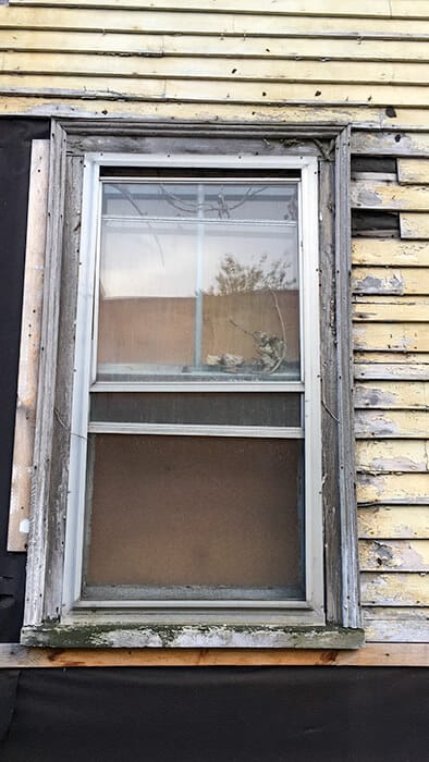 Window on the yellow Grimshawe House