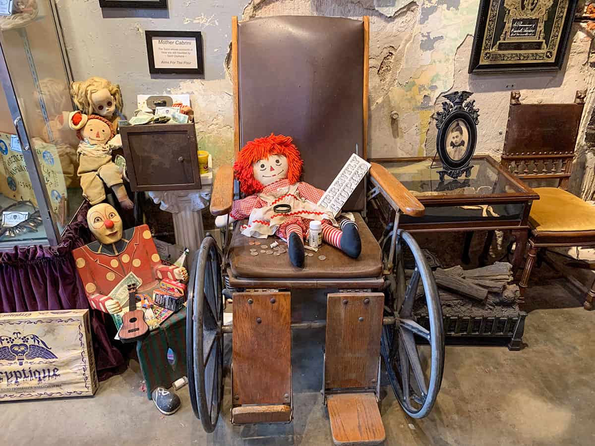 Spend Halloween in New Orleans at the haunted museum. See this haunted doll sitting in a haunted wheelchair.